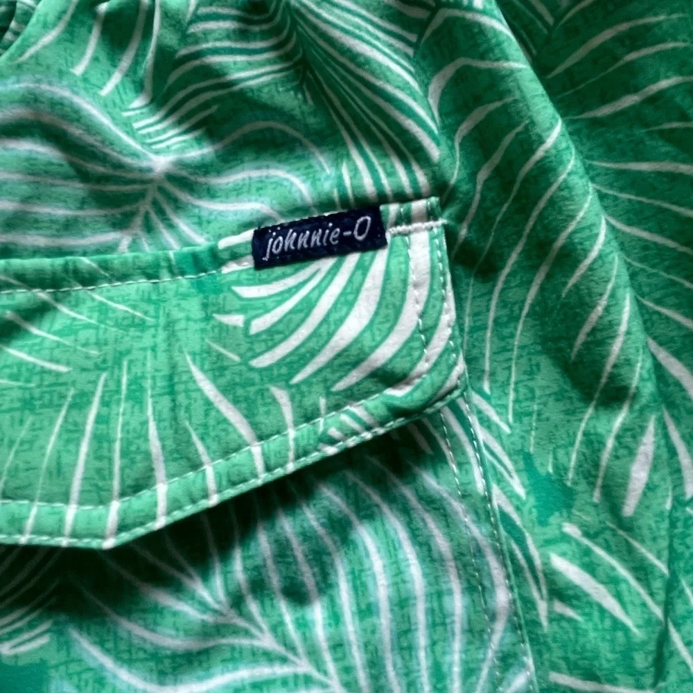 Johnnie-O swim shorts- green leaf design- size men’s large elastic in back.